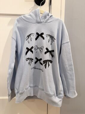 Abercrombie & Fitch Light Blue Hoodie with Black Bow Graphics
